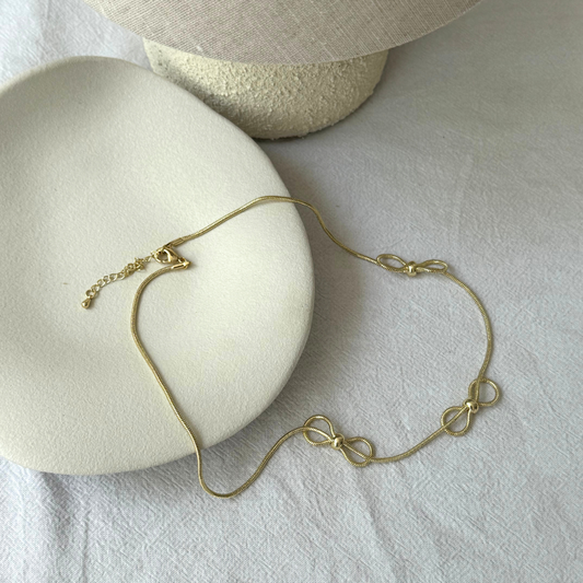 Choker Moños Dorados